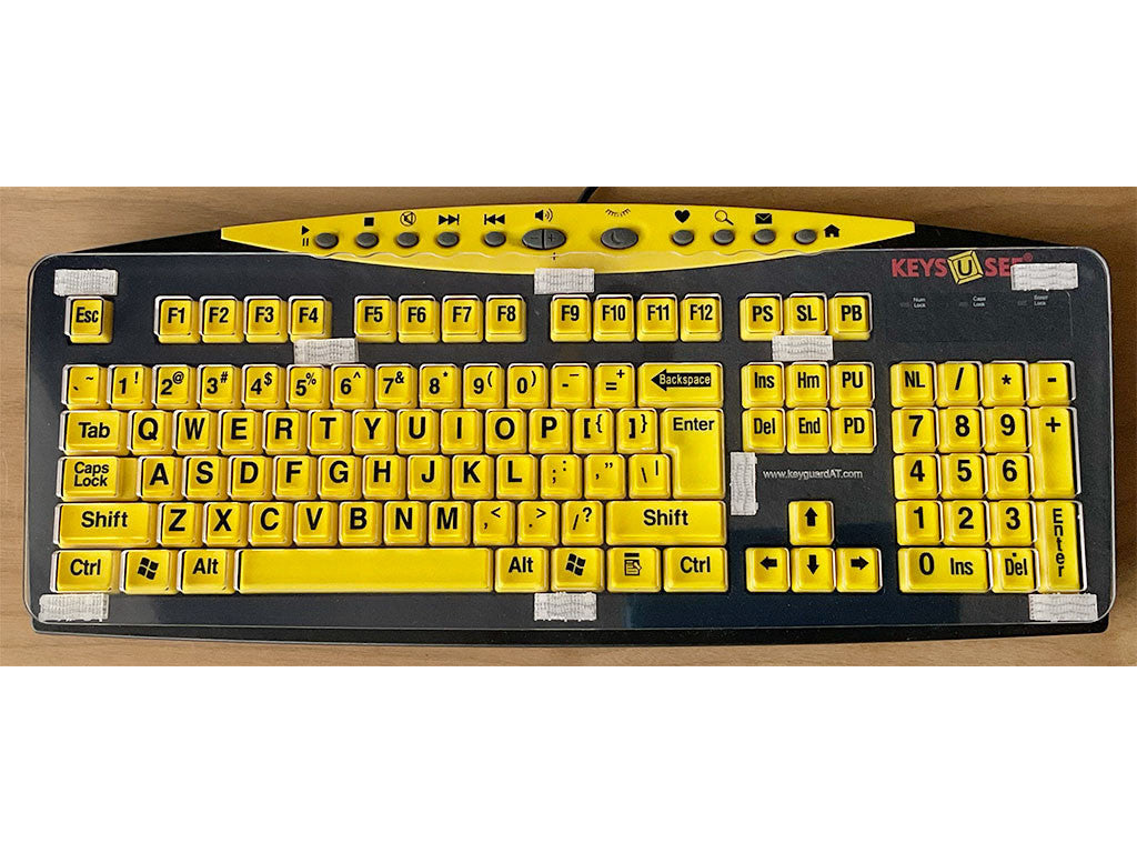 Keyguard on the AbleNet Keys-U-See keyboard.